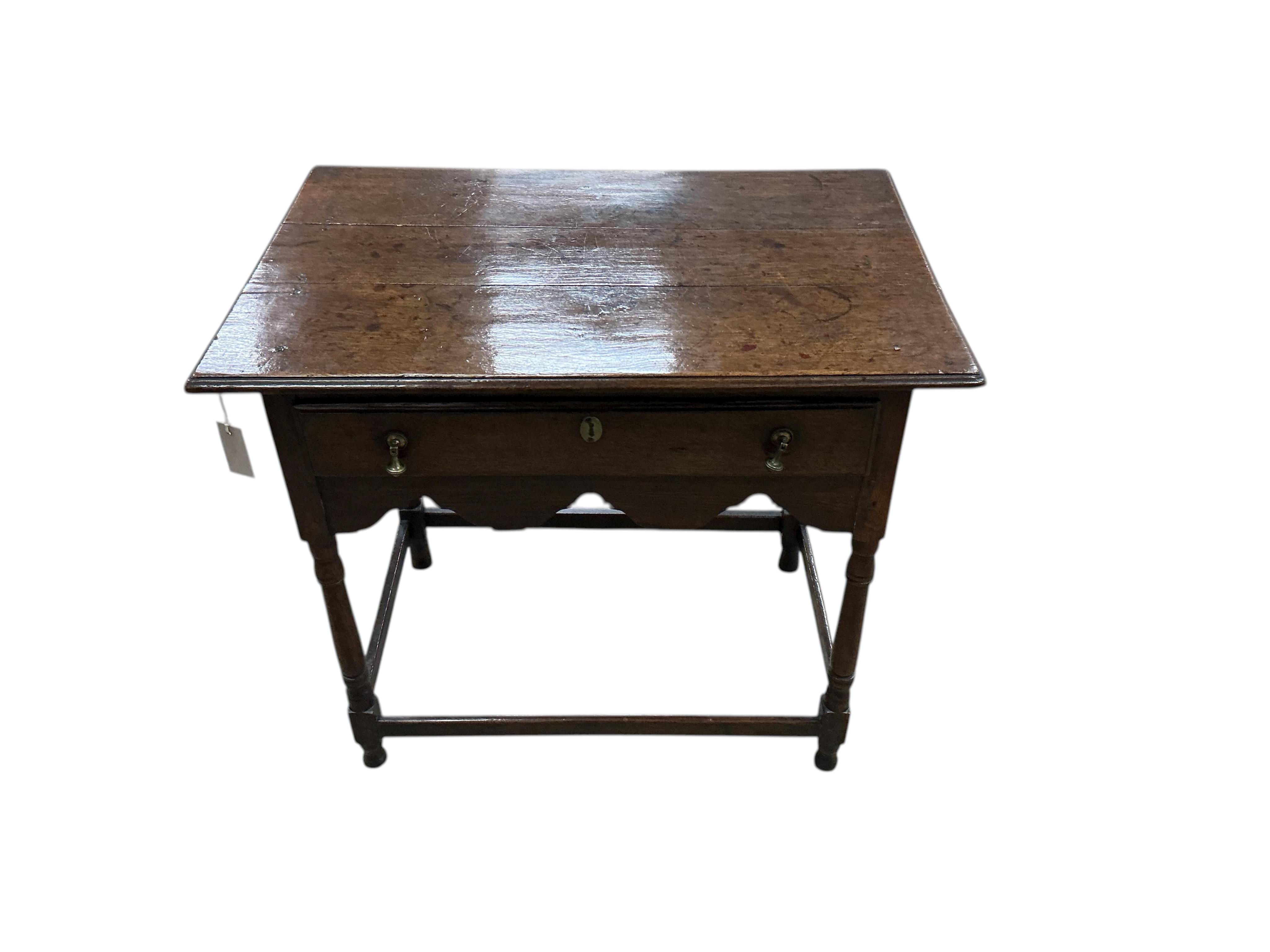 An 18th century oak side table, width 86cm, depth 58cm, height 74cm